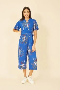 Mela London Blue Floral Print Jumpsuit With Angel Sleeves